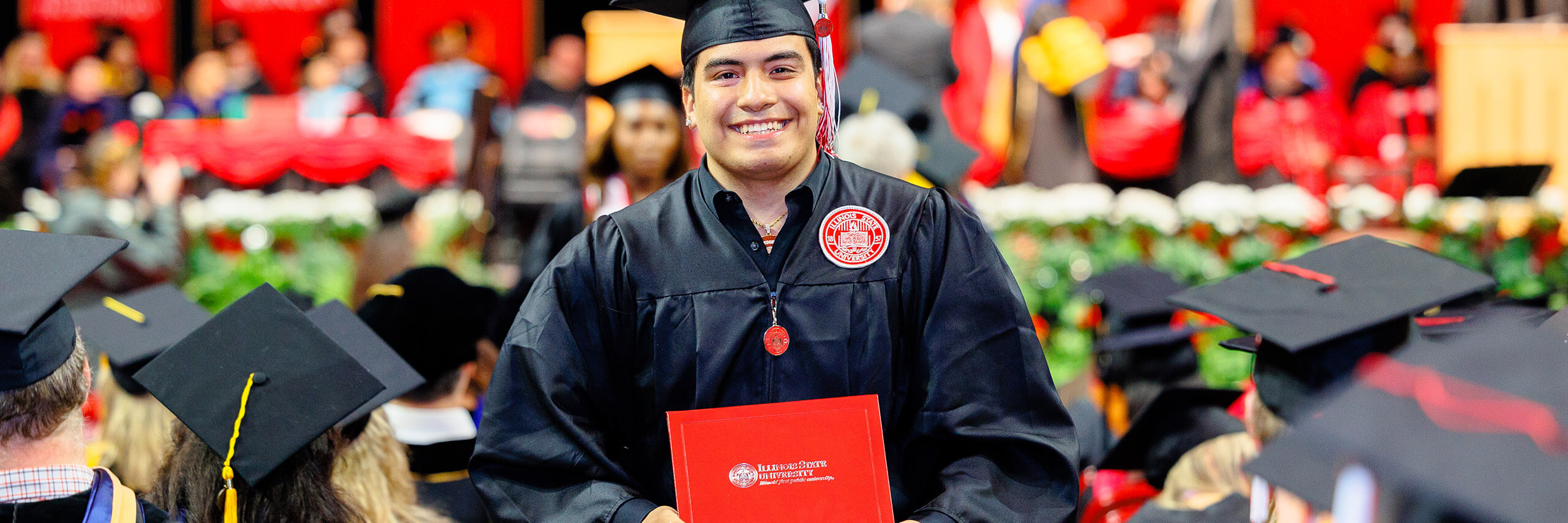 Student walking on commencement event