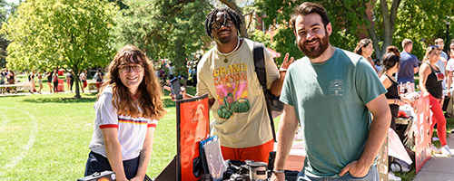 Photography ISU club students and advisor at Welcome Week event
